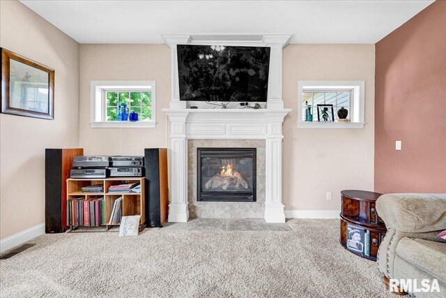 1712 Rustic Oak Dr, Washington, IL 61571 - carpeted living room featuring baseboards and a tiled fireplace
