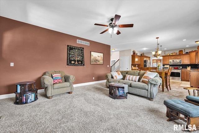 1712 Rustic Oak Dr, Washington, IL 61571 - living area featuring light carpet, a ceiling fan, stairway, and recessed lighting