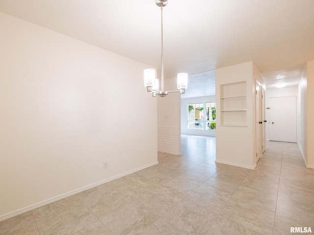743 W Wonderview Dr, Dunlap, IL 61525 - empty room featuring a chandelier and light tile patterned flooring