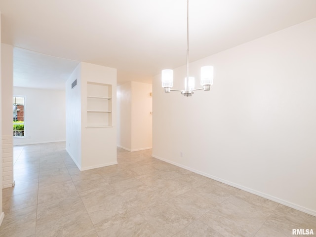 743 W Wonderview Dr, Dunlap, IL 61525 - empty room with a chandelier, built in shelves, and light tile patterned floors