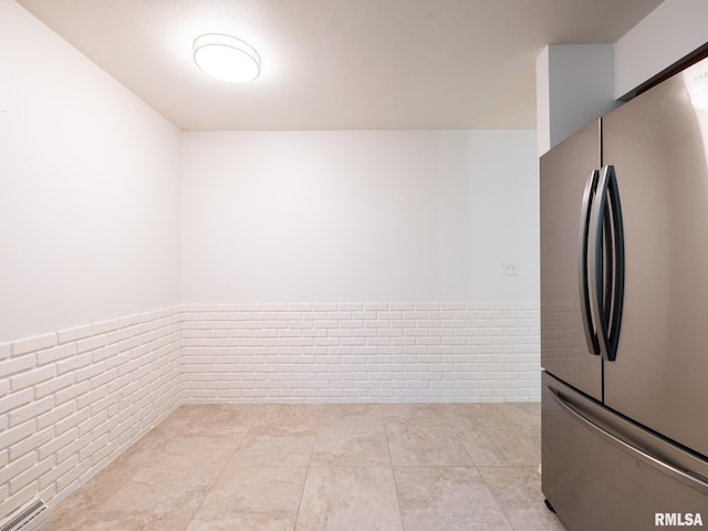 743 W Wonderview Dr, Dunlap, IL 61525 - kitchen with freestanding refrigerator and a wainscoted wall