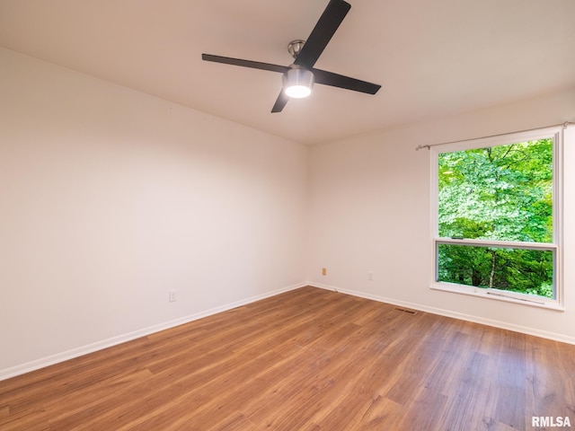 743 W Wonderview Dr, Dunlap, IL 61525 - empty room with light wood-style flooring and a ceiling fan