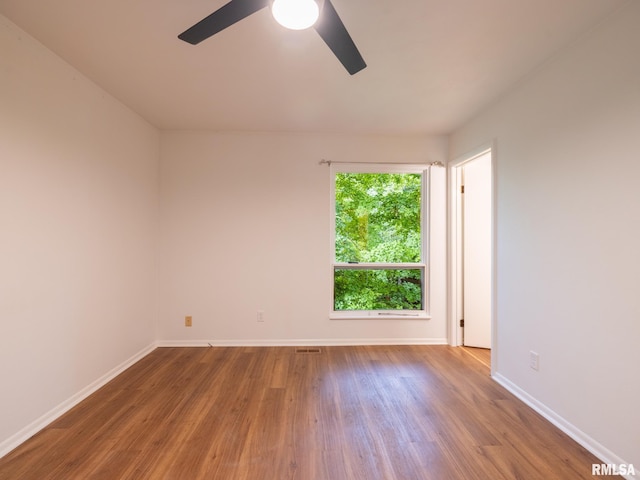 743 W Wonderview Dr, Dunlap, IL 61525 - unfurnished room with wood finished floors and a ceiling fan