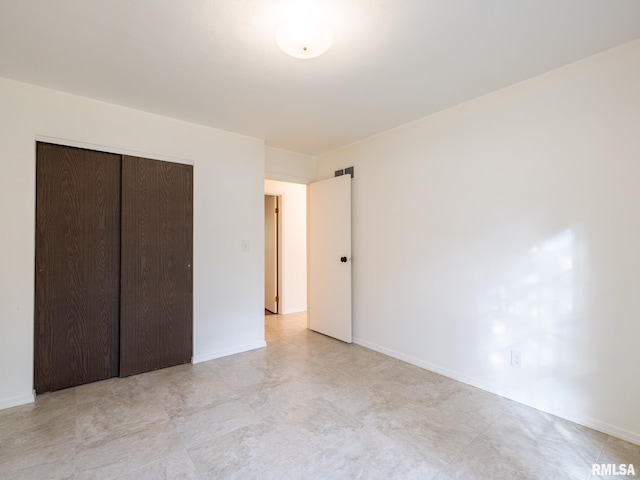 743 W Wonderview Dr, Dunlap, IL 61525 - unfurnished bedroom featuring light wood-style flooring, a closet, and ceiling fan