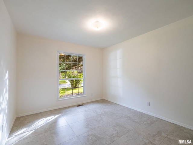 743 W Wonderview Dr, Dunlap, IL 61525 - tiled empty room featuring baseboards