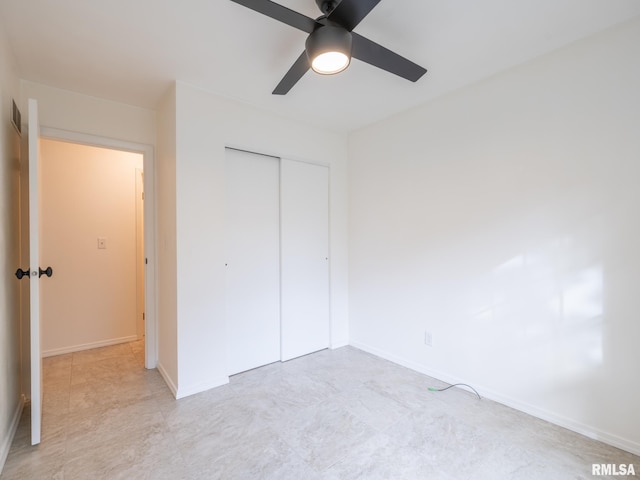 743 W Wonderview Dr, Dunlap, IL 61525 - unfurnished bedroom featuring a closet and a ceiling fan