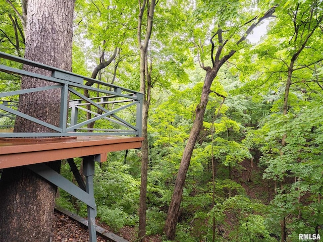 743 W Wonderview Dr, Dunlap, IL 61525 - wooden deck featuring a wooded view