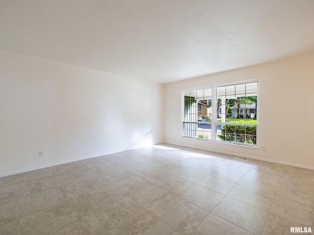 743 W Wonderview Dr, Dunlap, IL 61525 - empty room featuring light tile patterned floors and baseboards