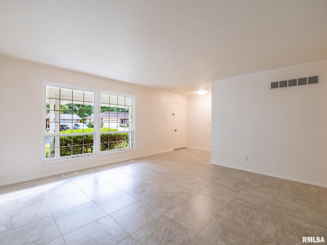 743 W Wonderview Dr, Dunlap, IL 61525 - unfurnished room featuring light tile patterned flooring and baseboards