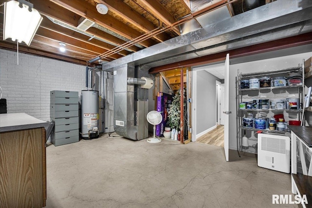 1619 Holland Ct, Chillicothe, IL 61523 - unfinished basement featuring water heater, heating unit, and brick wall