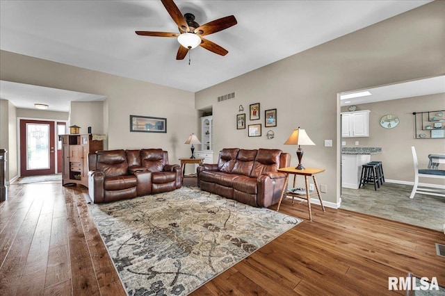 1619 Holland Ct, Chillicothe, IL 61523 - living area featuring a ceiling fan and wood-type flooring