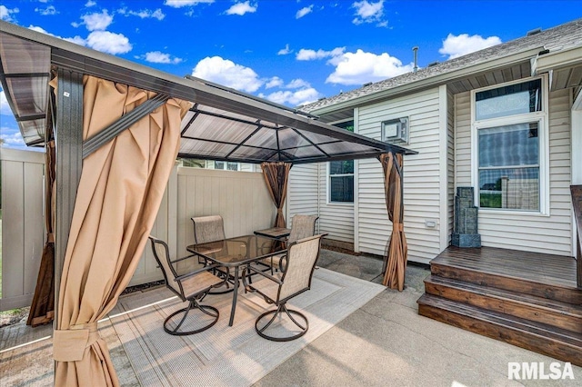 1619 Holland Ct, Chillicothe, IL 61523 - view of patio / terrace featuring a gazebo and outdoor dining area