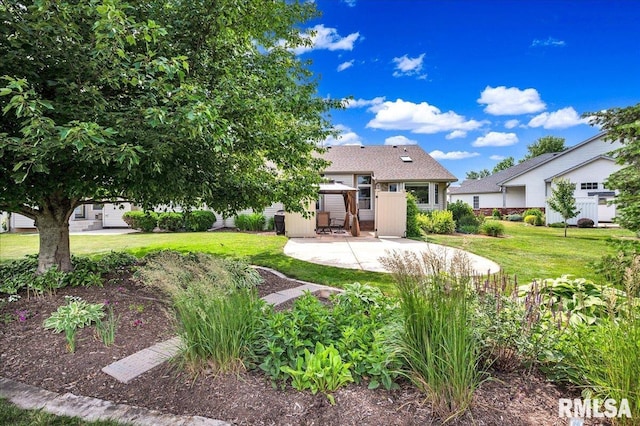 1619 Holland Ct, Chillicothe, IL 61523 - back of house with a patio and a lawn