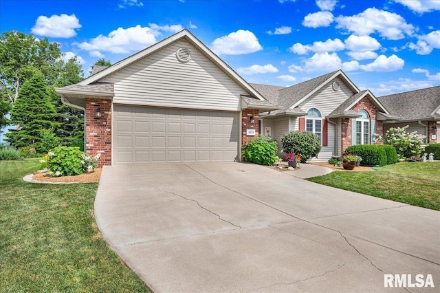 1619 Holland Ct, Chillicothe, IL 61523 - single story home featuring brick siding, a garage, driveway, and a front yard
