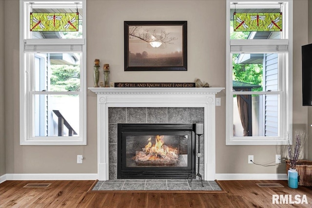 1619 Holland Ct, Chillicothe, IL 61523 - detailed view of wood finished floors and a tile fireplace