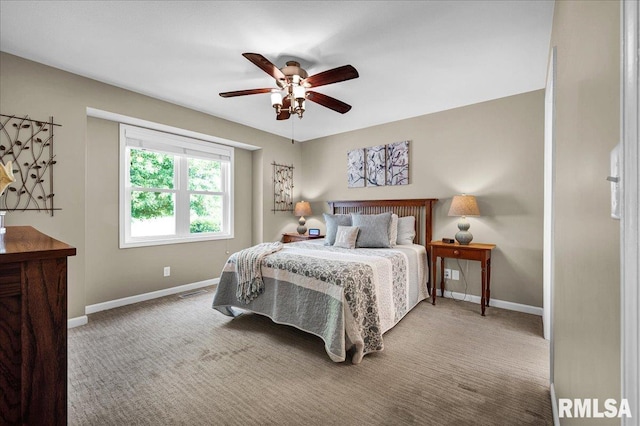 1619 Holland Ct, Chillicothe, IL 61523 - carpeted bedroom featuring baseboards and ceiling fan