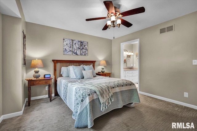 1619 Holland Ct, Chillicothe, IL 61523 - carpeted bedroom featuring ensuite bathroom and ceiling fan