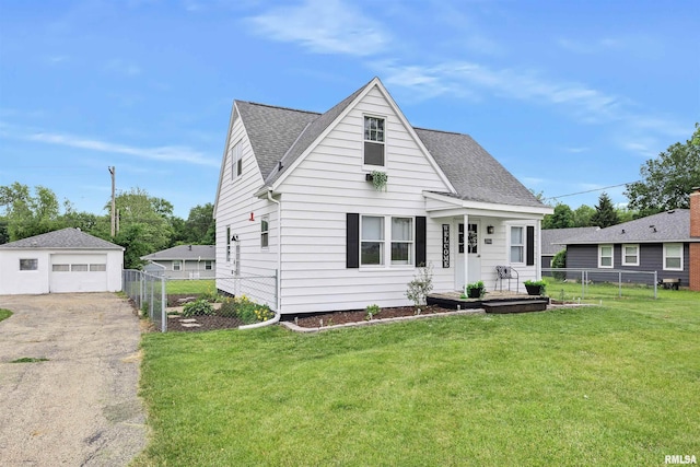 1900 S Airport Rd, Peoria, IL 61607 - view of front of home featuring an outdoor structure, driveway, a garage, and roof with shingles