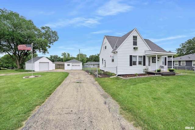 1900 S Airport Rd, Peoria, IL 61607 - view of front of house featuring a garage, an outdoor structure, and a shingled roof