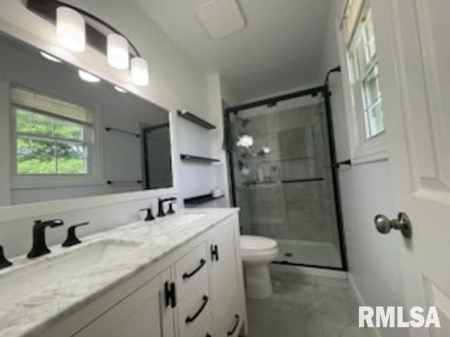 8109 N Blackbridge Rd, Edwards, IL 61528 - full bathroom featuring a stall shower and double vanity