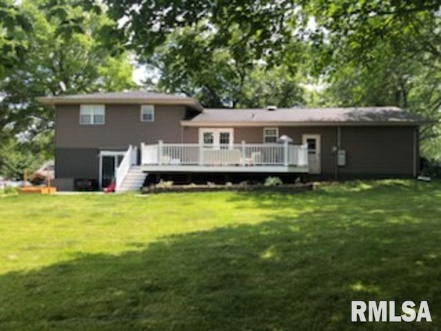 8109 N Blackbridge Rd, Edwards, IL 61528 - rear view of house featuring a wooden deck and a yard