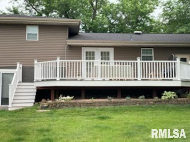 8109 N Blackbridge Rd, Edwards, IL 61528 - back of property with a lawn, a deck, and stairway