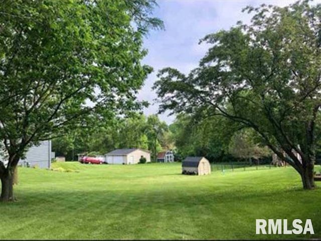 8109 N Blackbridge Rd, Edwards, IL 61528 - view of grassy yard featuring a storage shed