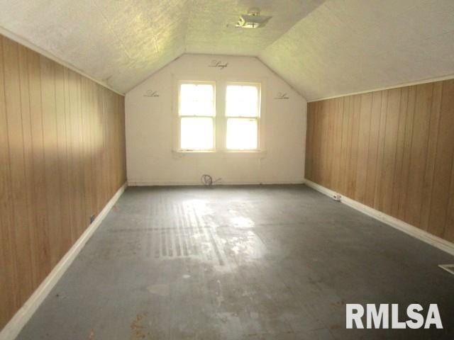 320 E Meadow Lawn St, Manito, IL 61546 - additional living space with wooden walls and lofted ceiling