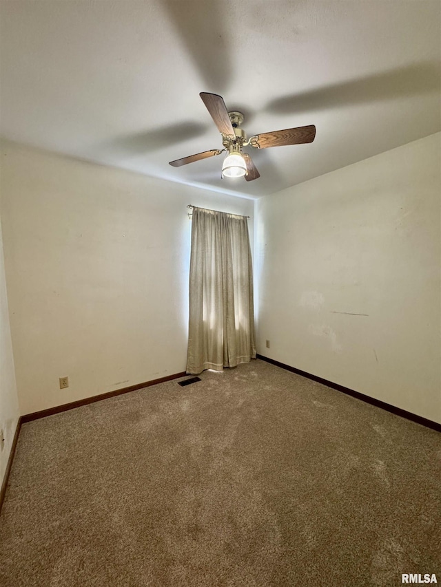 3813 W Brighton Ave, Peoria, IL 61615 - carpeted spare room with a ceiling fan and baseboards