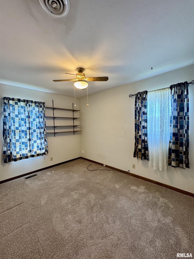 3813 W Brighton Ave, Peoria, IL 61615 - spare room with carpet flooring and a ceiling fan