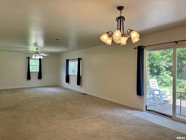 3813 W Brighton Ave, Peoria, IL 61615 - unfurnished room featuring light colored carpet, a chandelier, and a ceiling fan