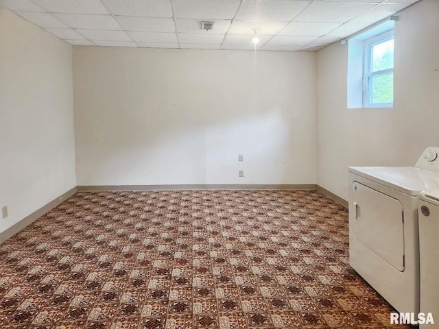 1003 Tonti Rd, Toulon, IL 61483 - washroom with washing machine and dryer and baseboards