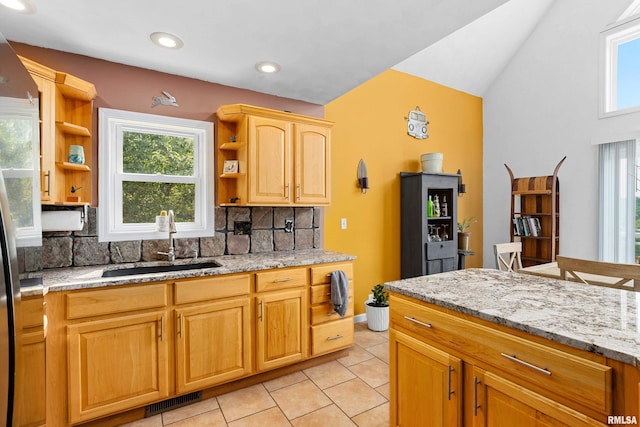 161 Lakecrest Pl, Dahinda, IL 61488 - kitchen with open shelves, tasteful backsplash, light tile patterned floors, lofted ceiling, and light stone counters