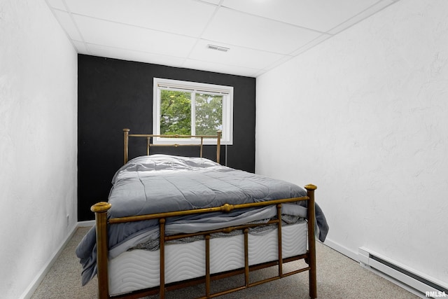 161 Lakecrest Pl, Dahinda, IL 61488 - bedroom featuring a baseboard heating unit, a drop ceiling, and carpet