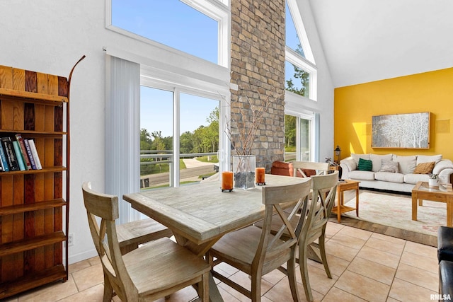 161 Lakecrest Pl, Dahinda, IL 61488 - dining space featuring high vaulted ceiling and light tile patterned flooring