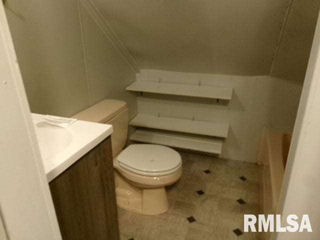 335 W Walnut St, Washburn, IL 61570 - bathroom featuring tile patterned floors, vanity, and a tub