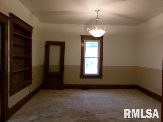 335 W Walnut St, Washburn, IL 61570 - carpeted spare room with baseboards