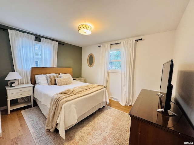 702 S Pearl St, Macomb, IL 61455 - bedroom with light wood-style floors