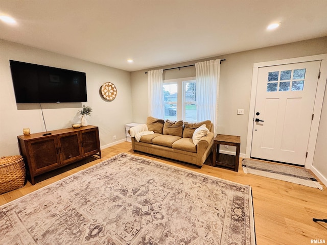 702 S Pearl St, Macomb, IL 61455 - living room with light wood-type flooring and recessed lighting
