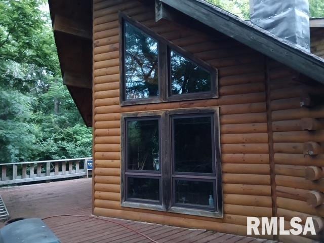 130 Zimmerman Rd, Spring Bay, IL 61611 - view of property exterior featuring a chimney