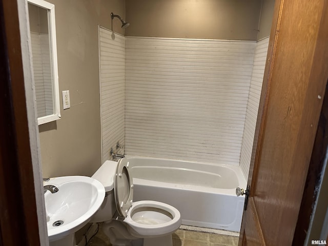 209 E Corrington Ave, Peoria, IL 61603 - bathroom featuring tub / shower combination and tile patterned flooring