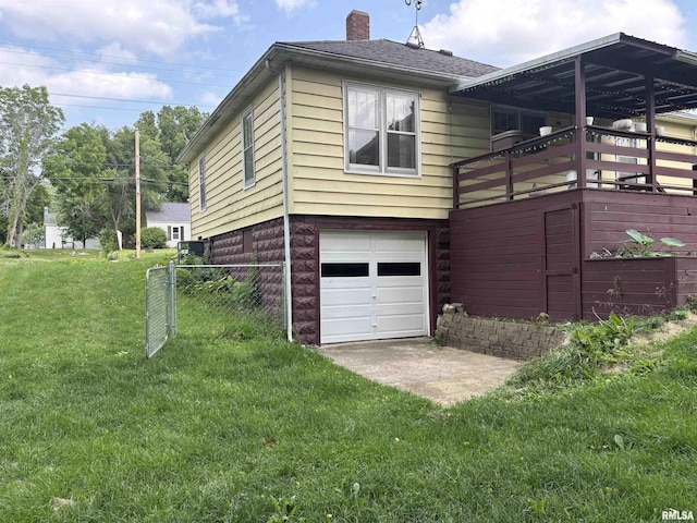 626 N Main St, Lewistown, IL 61542 - view of side of home with a chimney, a garage, and roof with shingles