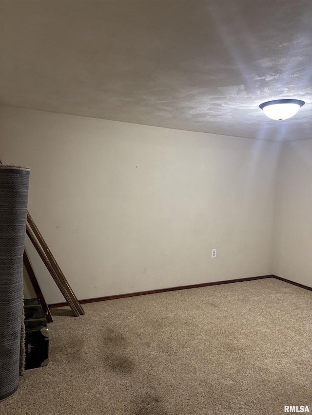 626 N Main St, Lewistown, IL 61542 - finished basement featuring carpet flooring and baseboards