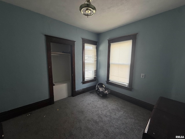 1712 W Bradley Ave, Peoria, IL 61606 - unfurnished bedroom with carpet floors