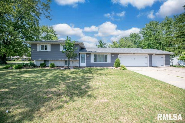 1200 Highview Rd, East Peoria, IL 61611 - split level home with a garage, driveway, and a front yard