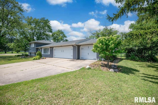 1200 Highview Rd, East Peoria, IL 61611 - view of front of home with an attached garage and driveway