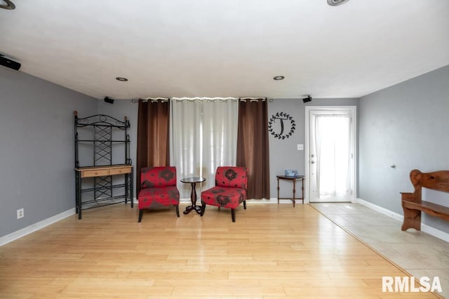 1200 Highview Rd, East Peoria, IL 61611 - sitting room featuring baseboards and light wood finished floors