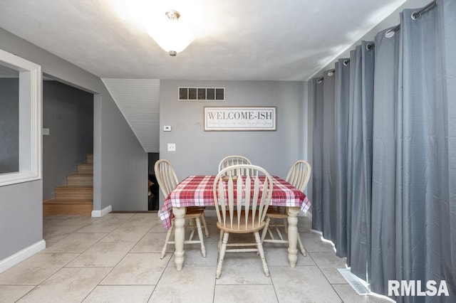 1200 Highview Rd, East Peoria, IL 61611 - dining space featuring stairs and light tile patterned floors