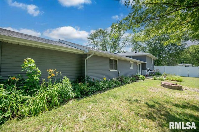 1200 Highview Rd, East Peoria, IL 61611 - view of home's exterior featuring an outdoor fire pit