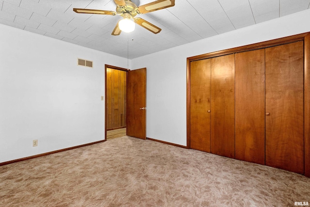 16905 E 1600th St, Bushnell, IL 61422 - unfurnished bedroom with a closet, carpet floors, and a ceiling fan